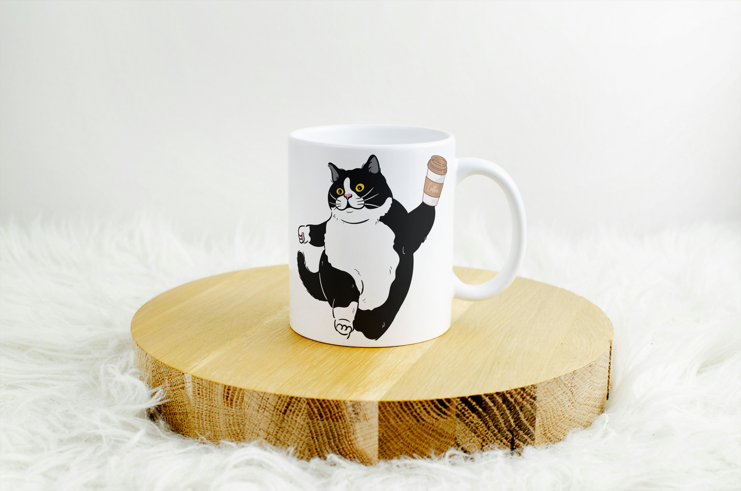 Fat Black & White Cat Holding Coffee Cup
