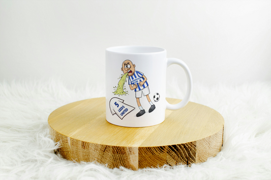 Huddersfield Town Fan Puking on Leeds United Top Mug – Funny Football Rivalry Mug