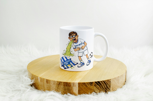 Funny Leeds United Mug – Throwing Up on Huddersfield Shirt